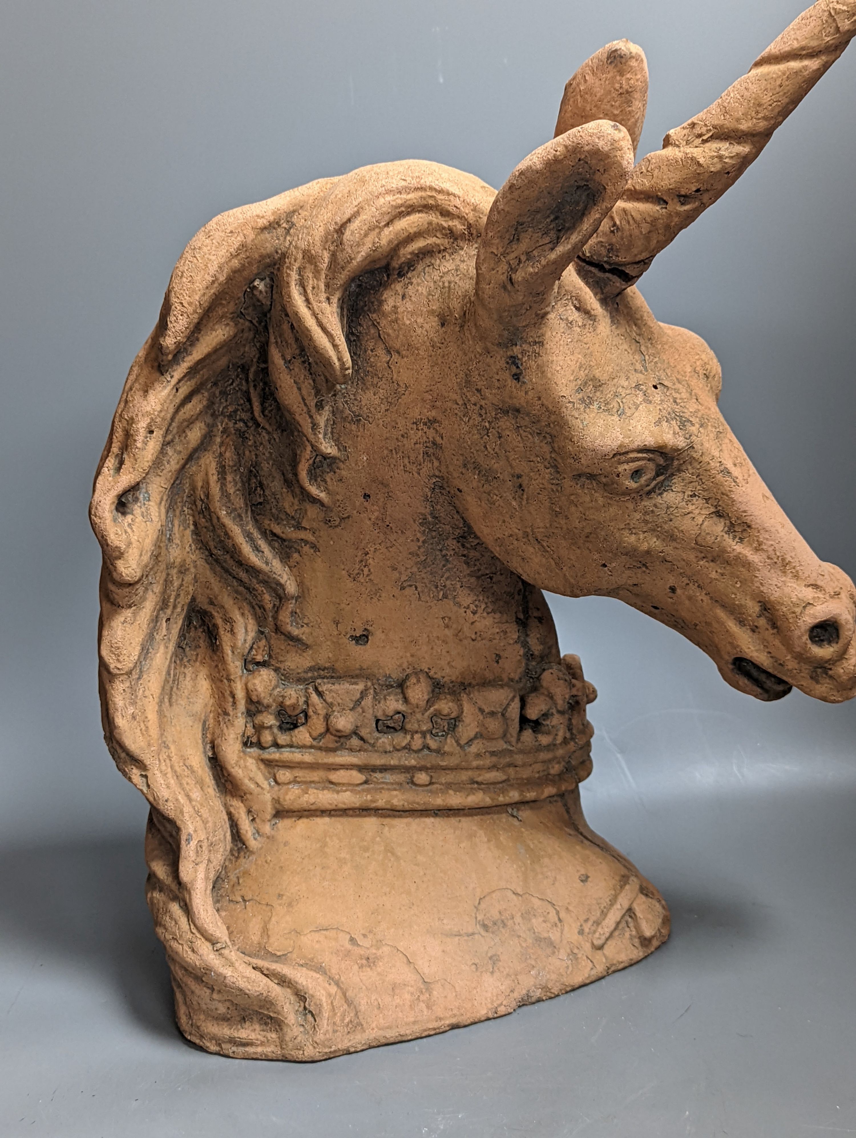 A Terracotta model of a unicorn head 45cm
